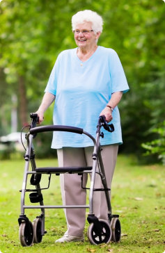 senior woman using walking aid supporter